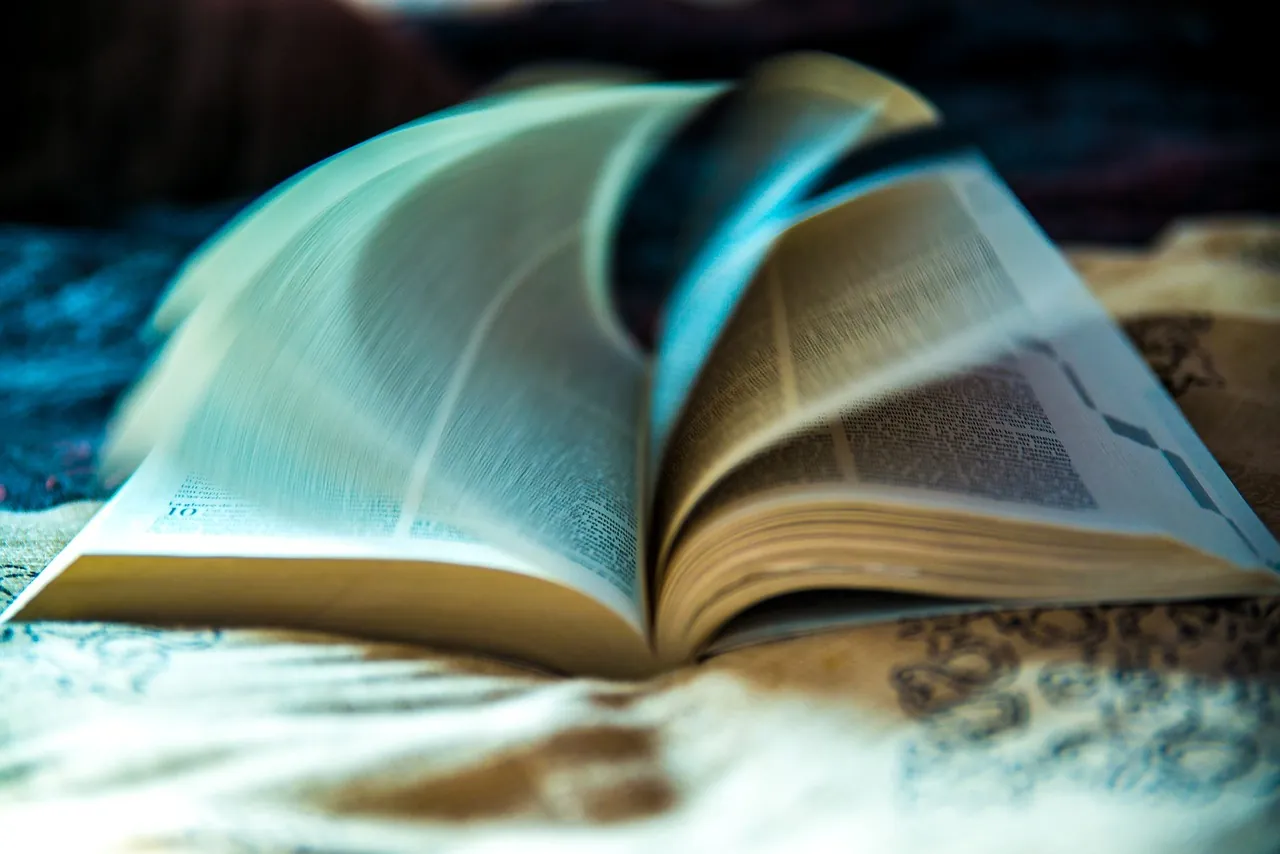 Book with pages turning in the wind